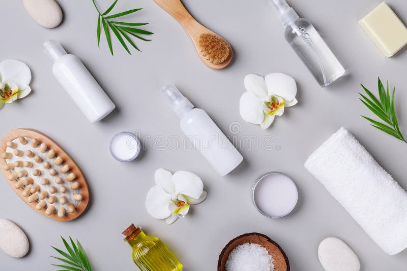Spa, aromatherapy, beauty treatment and wellness background with massage brush, towel, orchid flowers and cosmetic products. royalty free stock images Spa, aromatherapy, beauty treatment and wellness background with massage brush, towel, orchid flowers and cosmetic products. royalty free stock images
