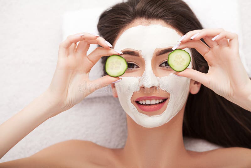 Spa. Attractive Funny Woman with a Clay Mask on Her Face. Stock Photo - Image of mask, people: 108456050 Spa. Attractive Funny Woman with a Clay Mask on Her Face. Stock Photo - Image of mask, people: 108456050