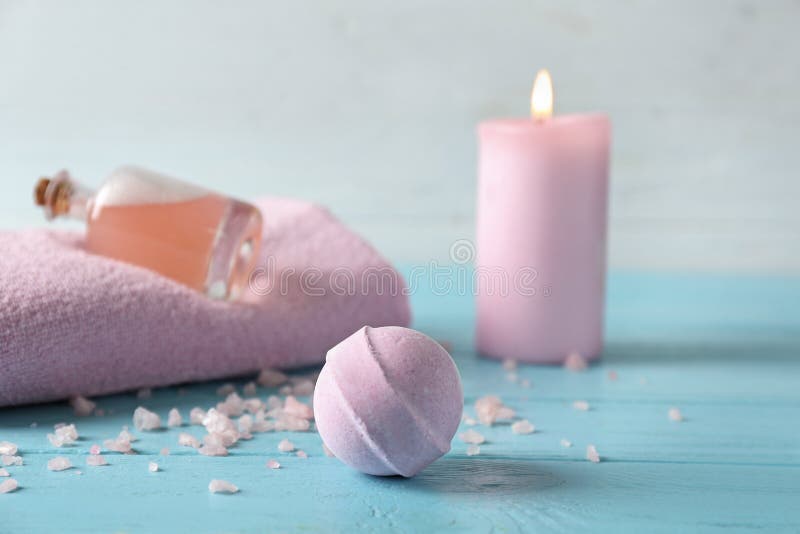 Spa composition with bath bomb on color table stock photos Spa composition with bath bomb on color table stock photos