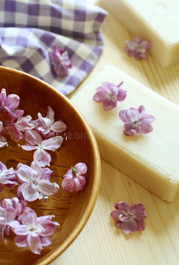 Spa composition of soap and lilac flowers