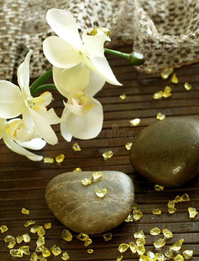 Spa composition of stones, bath salts and orchid f stock images