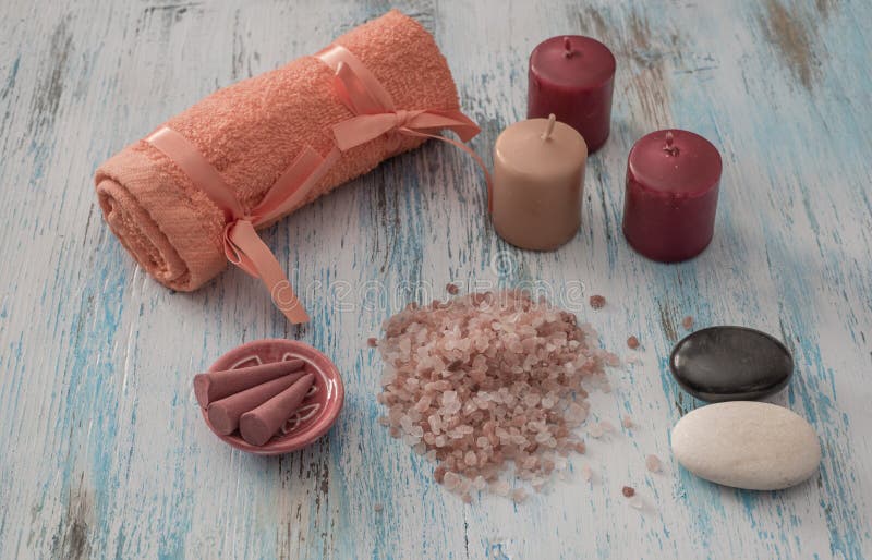 Spa concept. candles, aromatic salt, and bath orange towel royalty free stock image Spa concept. candles, aromatic salt, and bath orange towel royalty free stock image