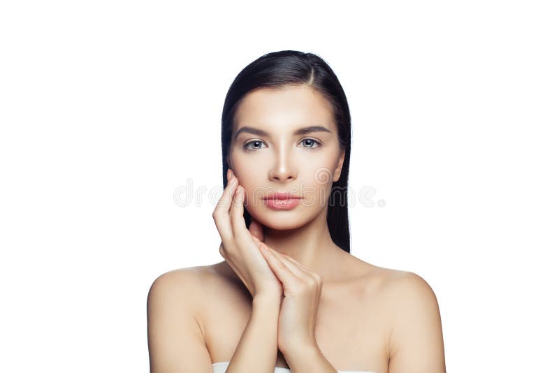 Spa girl with clear skin isolated on white.