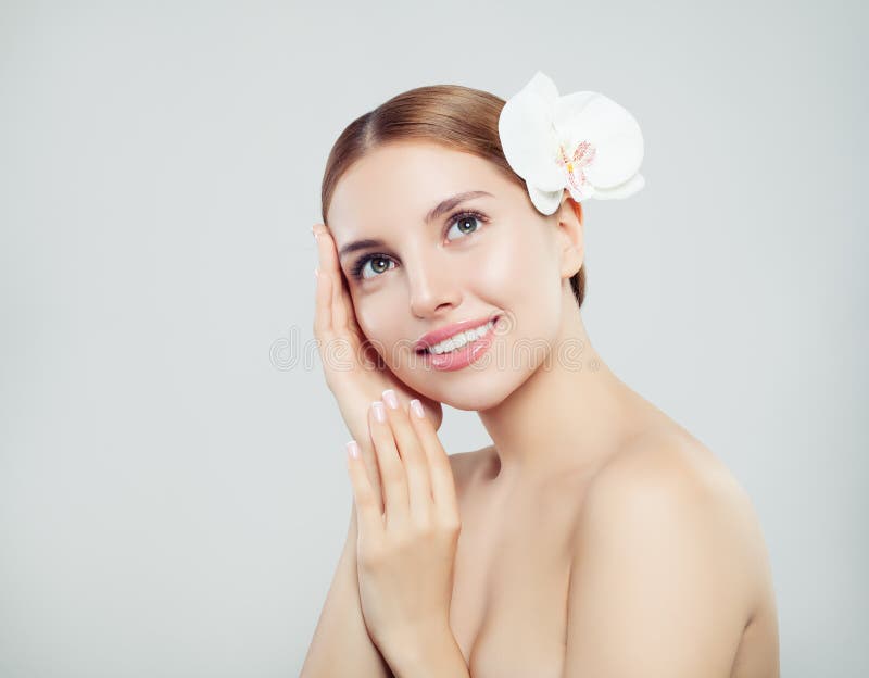 Spa girl looking up on white background