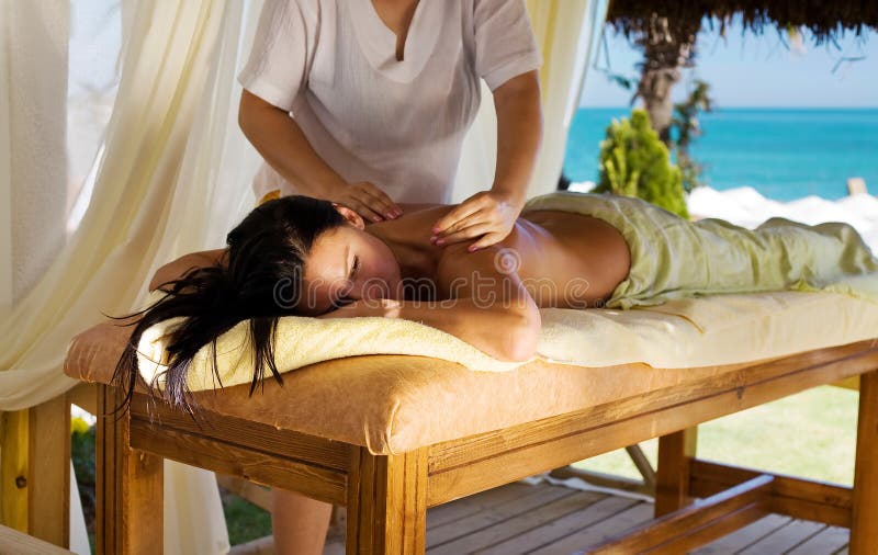 Spa massage at luxury resort.