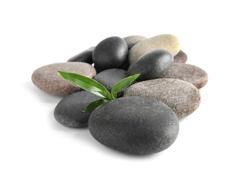 Spa stones with bamboo on white royalty free stock photo Spa stones with bamboo on white royalty free stock photo