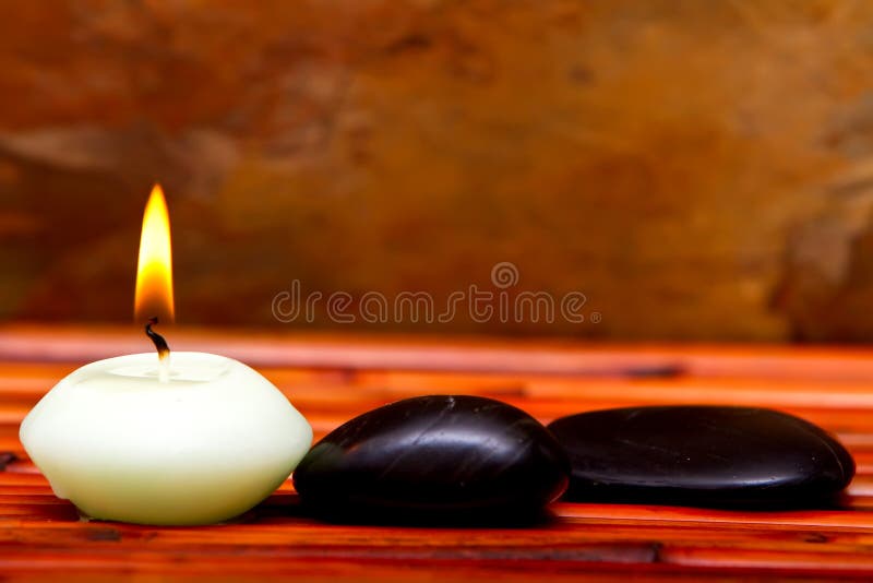 Spa Stones and Candles on Bamboo Stock Photo Image of front, focus