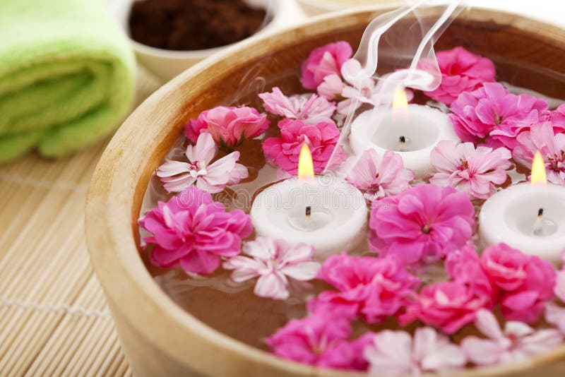 Spa Therapy, Flowers in Water, on a Bamboo Mat. Stock Image Image of
