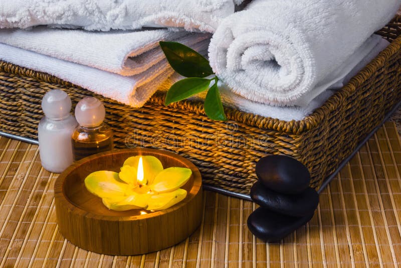 Spa with towels and candle stock photo. Image of harmony 48688764
