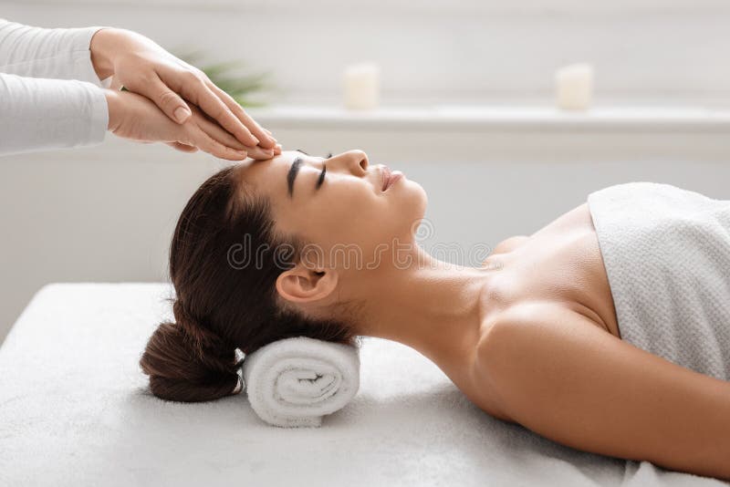 Young Attractive Korean Woman Getting Acupressure Massage Treatment In