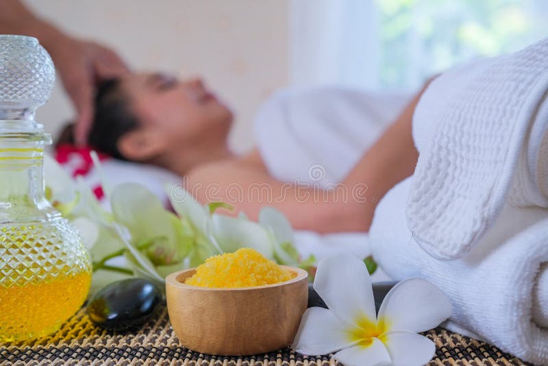 Spa Treatment Set And Aromatic Massage Oil On Bed Massage Thai Setting