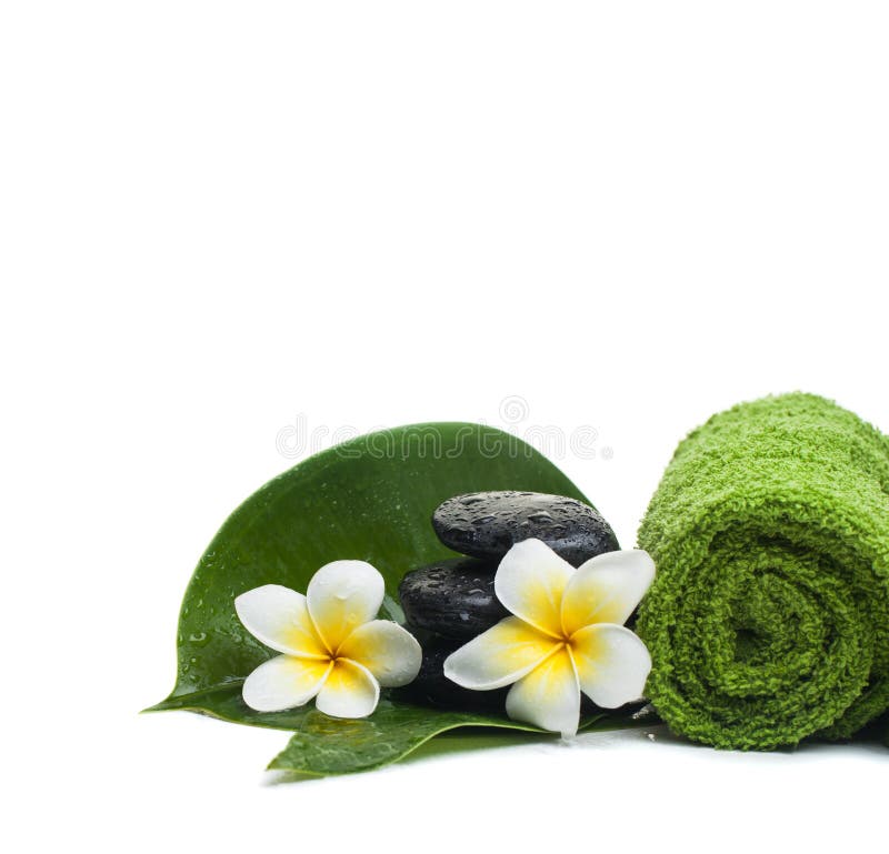 Spa tropical Flowers with green towel for healthy therapy royalty free stock photos Spa tropical Flowers with green towel for healthy therapy royalty free stock photos