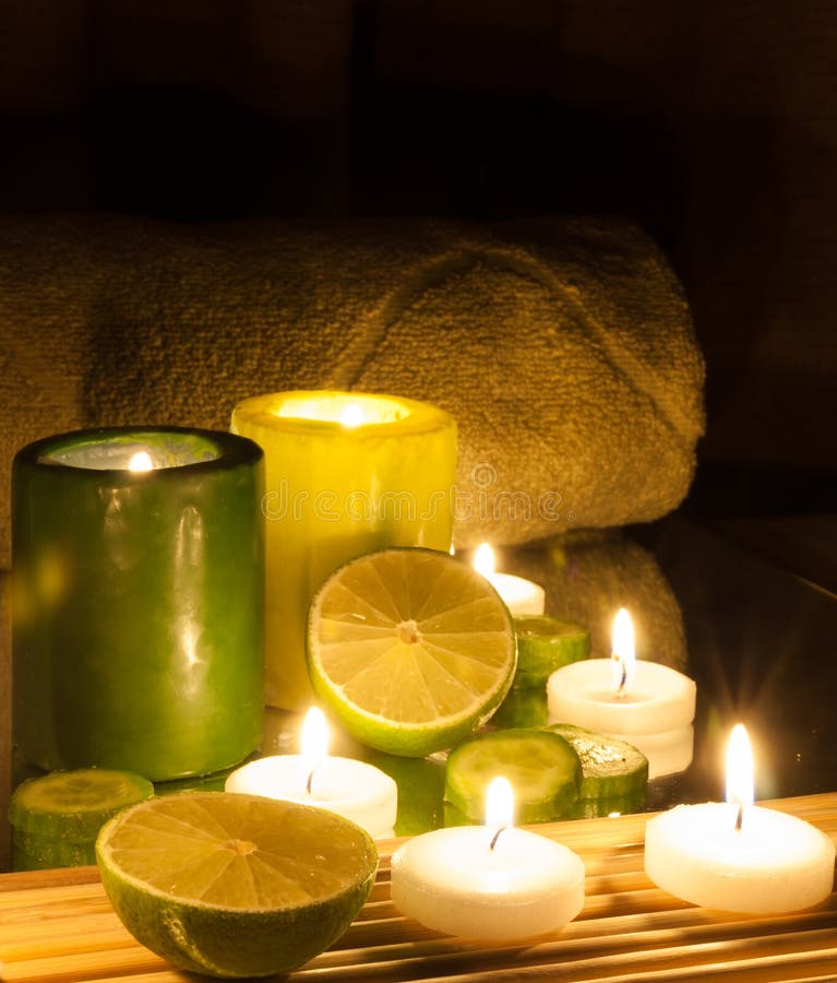 Spa and Wellness Setting Green and Yellow Candles Lit, Lemon Green