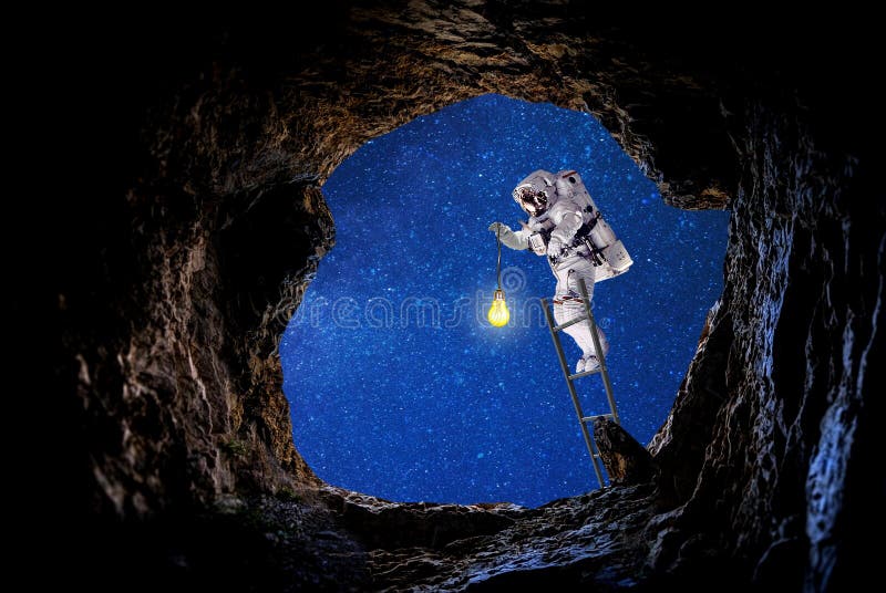 Spaceman lighting witch light bulb route in outer space. royalty free illustration