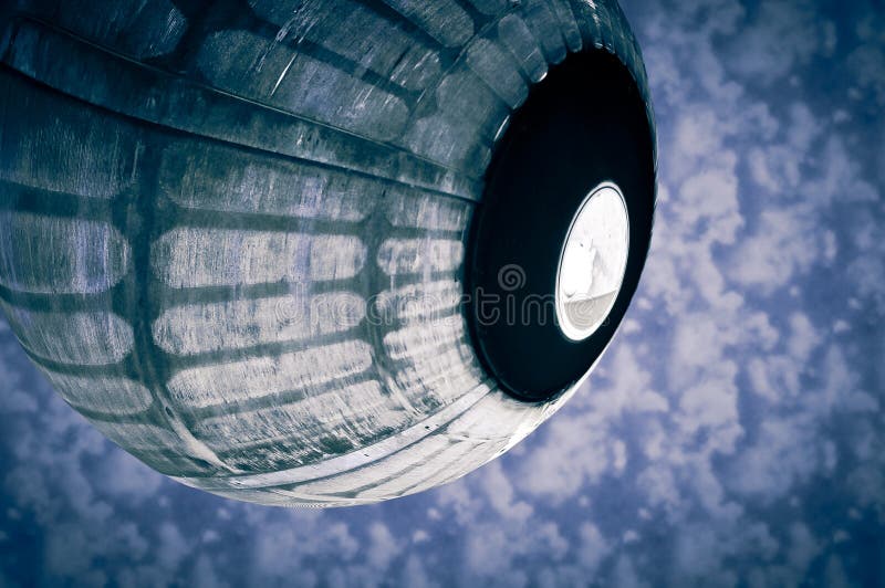Spaceship capsule over clouds