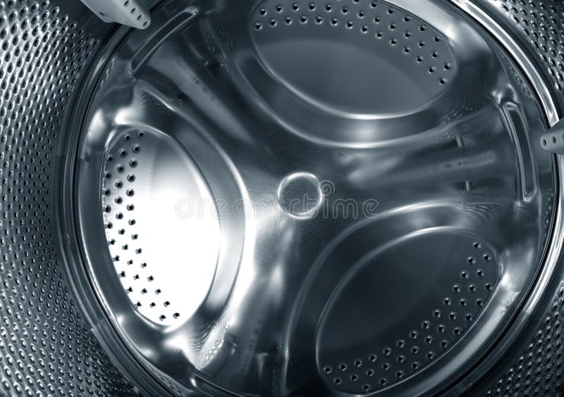 Close-up photo of the metal circular element of washing machine. Metal steel drum stock images, royalty-free photos and pictures