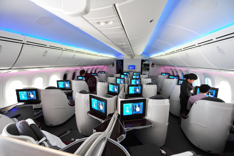 Spacious business class cabin of Qatar Airways Boeing 787-8 Dreamliner at Singapore Airshow