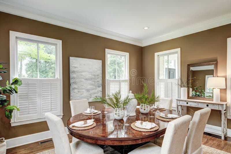 Spacious Dining Room Interior with Tasteful Furniture Stock Image