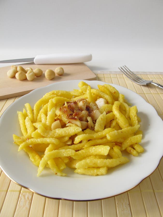 Spaetzle with Roasted Macadamia Nuts Stock Image - Image of sweetened ...