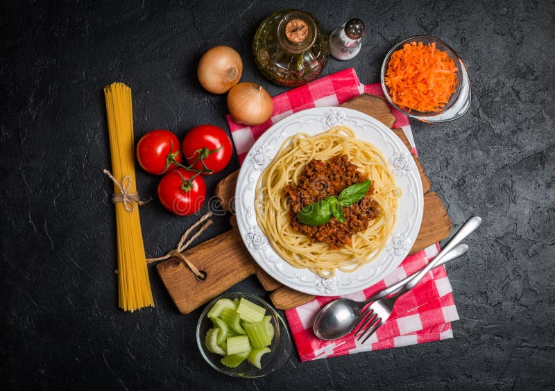 Spaghetti bolognese with ingredients