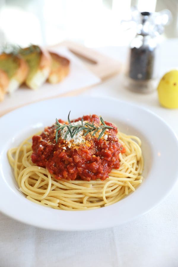 Spaghetti bolognese tomato sauce with bread , italian food