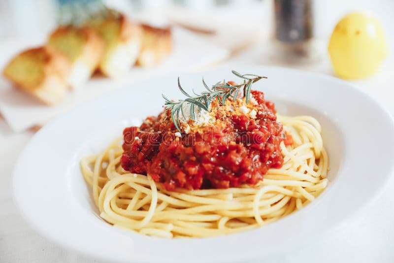 Spaghetti bolognese tomato sauce with bread , italian food