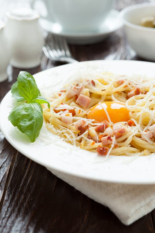 Spaghetti Carbonara with Yolk and Parmesan Cheese in a White Bow Stock Photo Image of italian