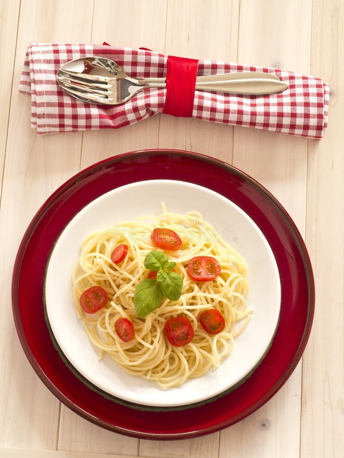 Pasta with fresh tomatoes royalty free stock photos