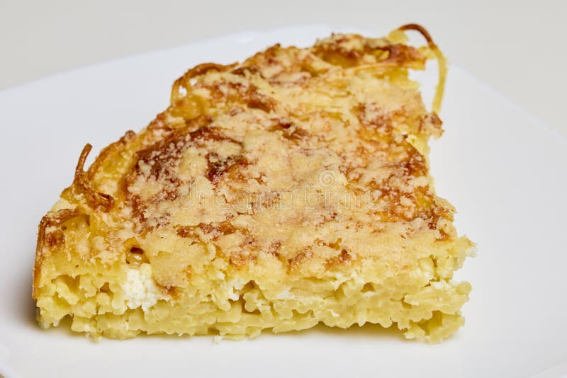 Spaghetti with Egg and Parmesan Cheese Cooked in the Oven Stock Image