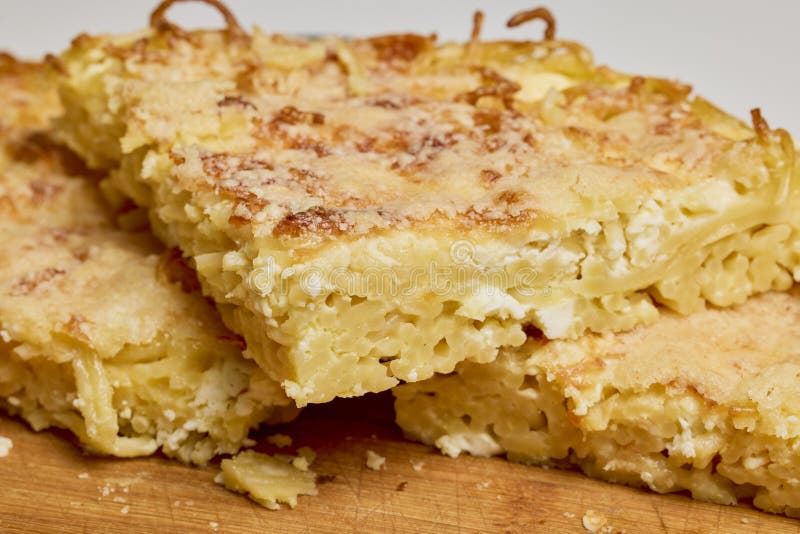 Spaghetti with Egg and Parmesan Cheese Cooked in the Oven Stock Photo