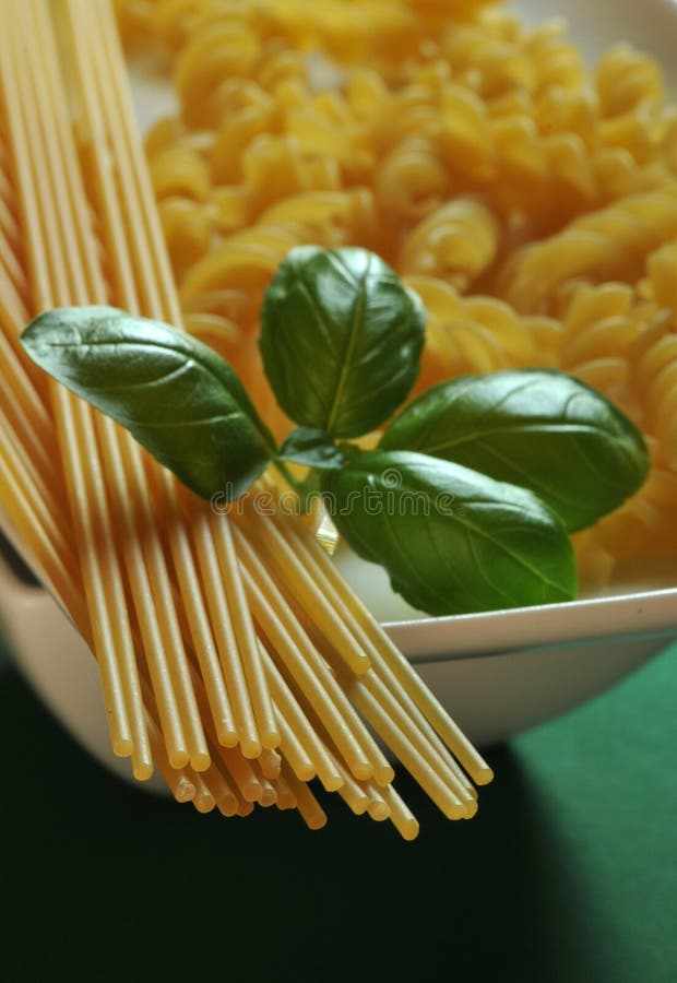 Spaghetti and Fusilli with Basil Leaves Stock Photo Image of
