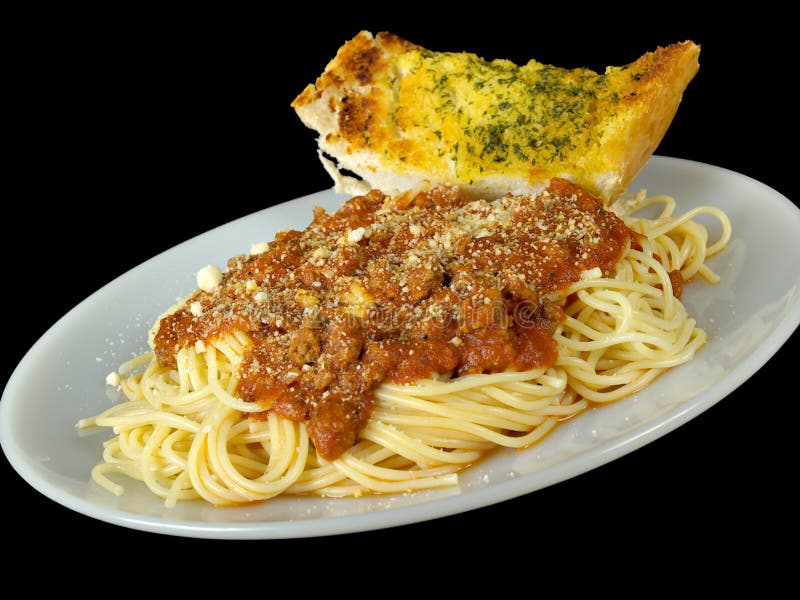 Spaghetti and Garlic Bread stock photo. Image of black 2578360