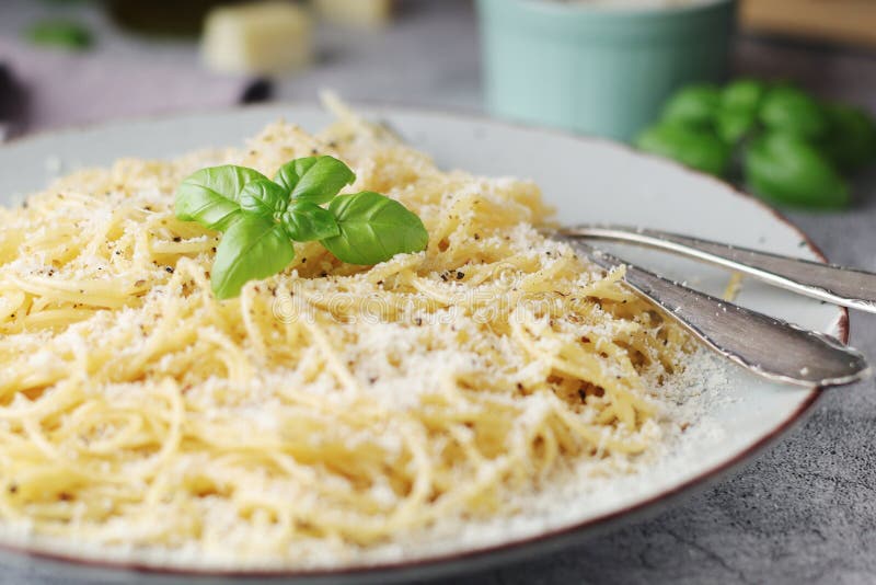 Spaghetti with Italian Cheese Pecorino Romano Stock Image - Image of ...