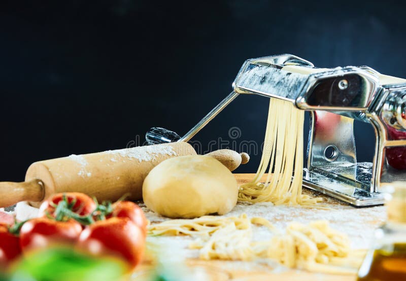 Spaghetti Machine Cutting Dough into Noodles Stock Photo Image of