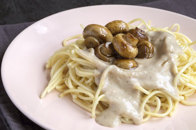 Spaghetti with Mushrooms in Cream Sauce. Stock Photo Image of recipe