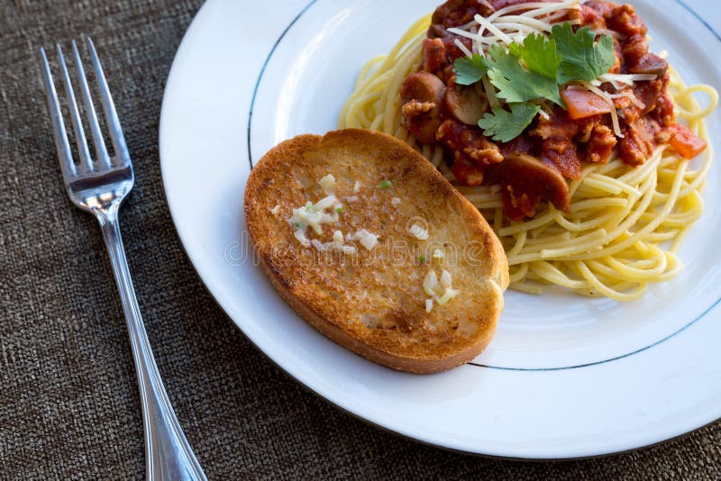 Spaghetti Pasta with Garlic Bread. Stock Image Image of pasta, bread
