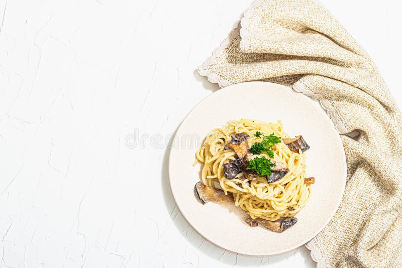 Spaghetti Pasta with Oyster Mushrooms, Creamy Sauce and Parsley