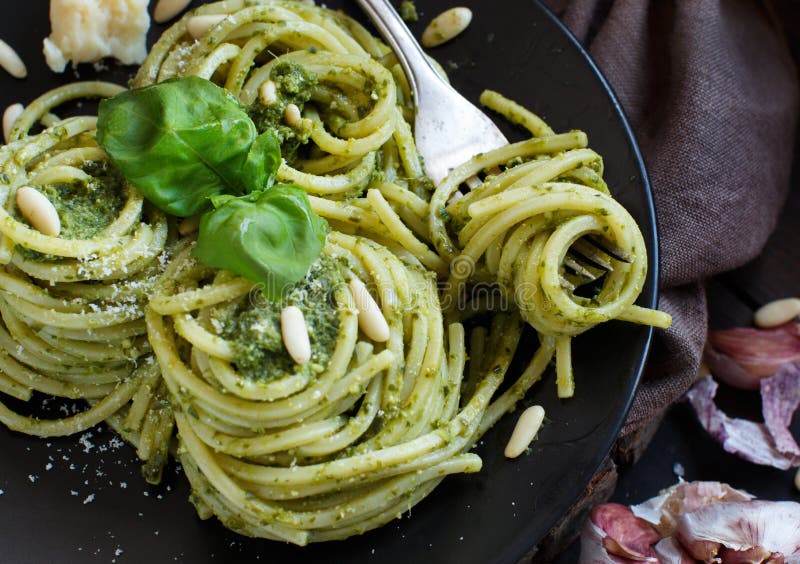 Spaghetti Pasta with Pesto Sauce, Basil, Pine Nuts and Parmesan Close