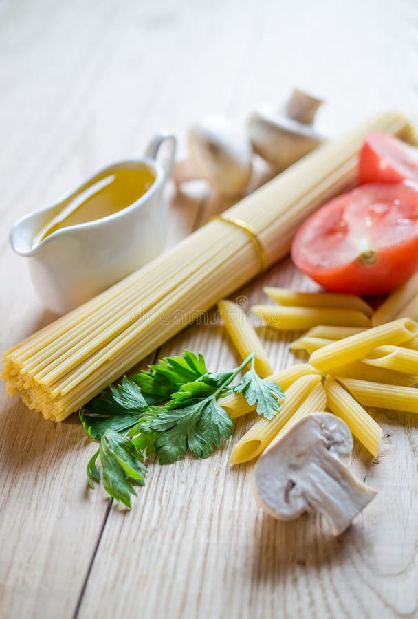 Spaghetti and penne stock image. Image of herb, food 32416873