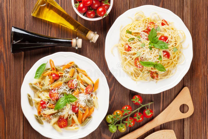 Spaghetti and Penne Pasta with Tomatoes and Basil Stock Image Image