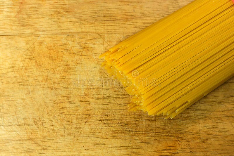 Spaghetti Raw in White on Wood Table Stock Photo Image of yellow
