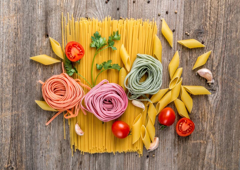 Spaghetti, rose looking macaroni in composition, topview