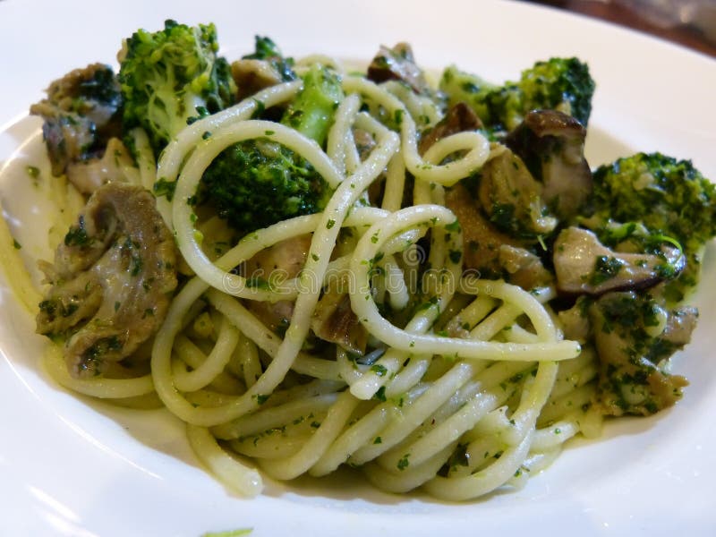 Spaghetti with Snails...yummy!! Stock Photo Image of broccoli, pesto 39227572