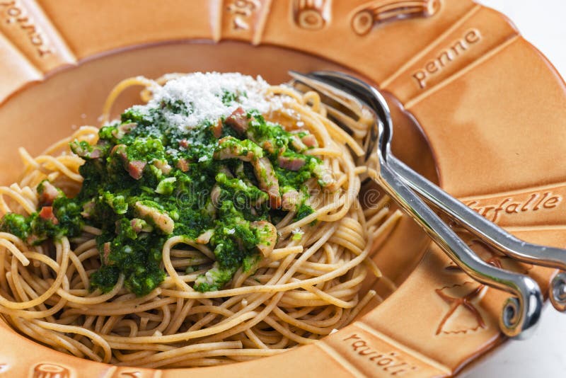 Spaghetti with Spinach Leaves, Bacon and Parmesan Cheese Stock Photo