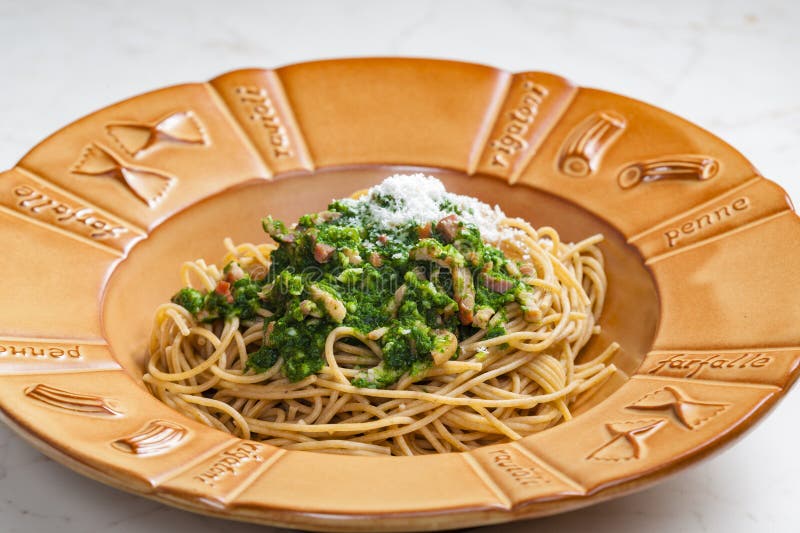 Spaghetti with Spinach Leaves, Bacon and Parmesan Cheese Stock Image
