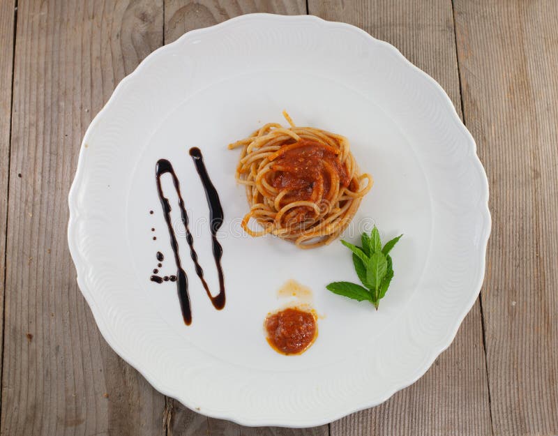 Spaghetti with tomato basil and mint typical Italian dish italy