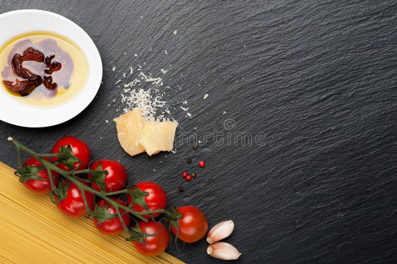 Spaghetti, tomatoes, cheese.