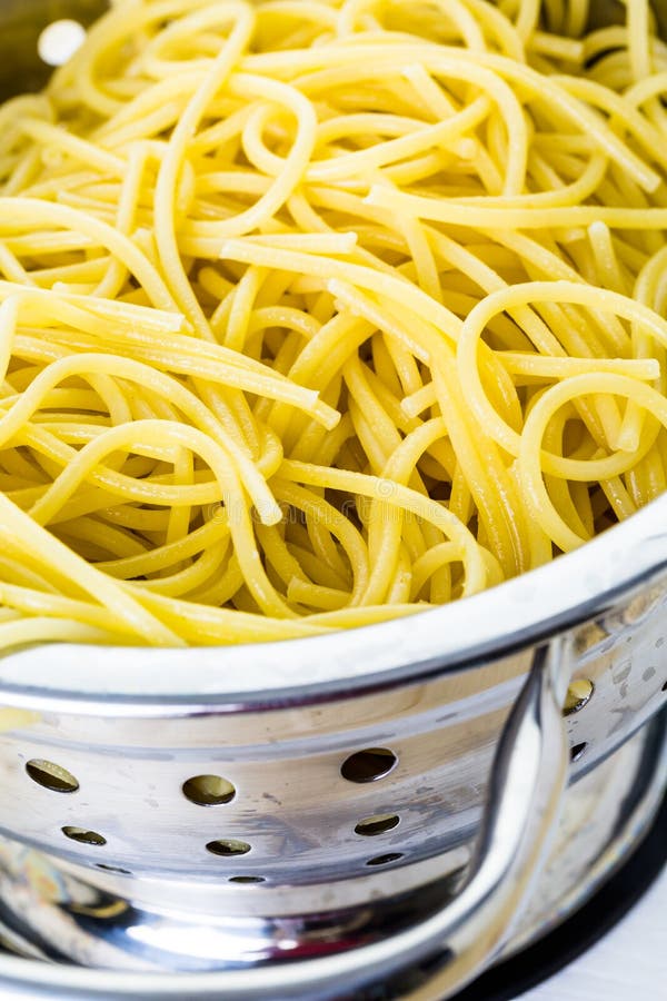 Spaghetty stock image. Image of pasta, holes, colander 51487955