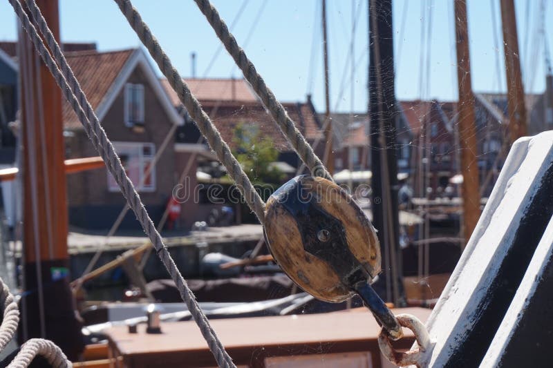 Historic fishing boat rope and parts, with spider web royalty free stock image Historic fishing boat rope and parts, with spider web royalty free stock image