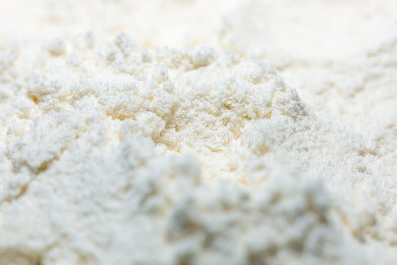 Scattered wheat flour. Home kitchen. Preparing the dough. Cake products. Product with a mill. White powder. Scattered wheat flour. Home kitchen. Preparing the dough. Cake products. Product with a mill. White powder.